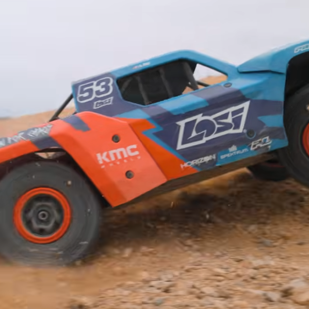 Losi 5IVE TE 3.0 12S electric desert truck climbing loose dirt during off-road review