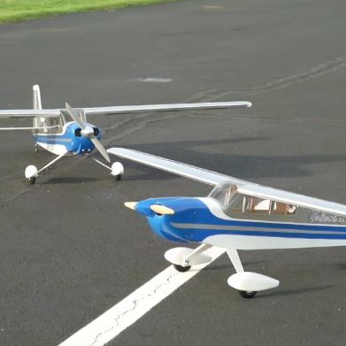 Hangar 9 Valiant 20cc EP PNP wood-built high-wing RC airplane at a club flying field
