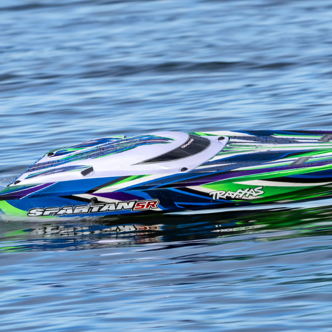 Traxxas Spartan SR self-righting 6S Deep-V RC boat running at high speed on water