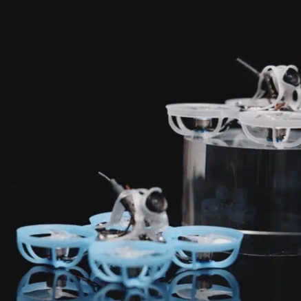 BETAFPV Air65 and Air75 Wisp whoop quadcopters displayed in blue and transparent frames, showcasing the lightweight brushless design for indoor FPV flying
