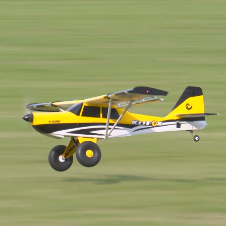 HobbyKing H-King KitFox Sport 1100mm 1250mm high wing RC sport plane flying over grass field
