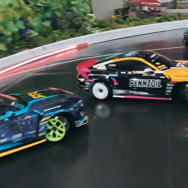HPI Stage D10 Ford Mustang RTR Spec-5 FD drift cars on an indoor RC drift track
