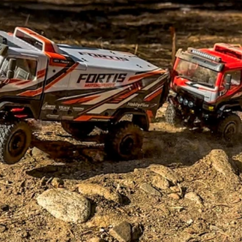 Hobby Plus DKR4 Fortis Brushless rally trucks testing on rocky dirt terrain