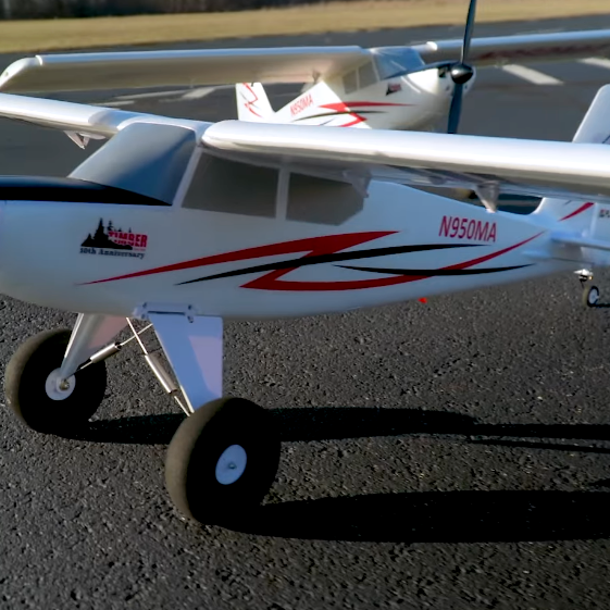 Eflite Timber 1.5m 10th Anniversary Edition RC airplane parked on runway in classic short-nose design