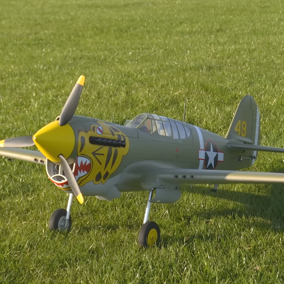 Durafly Curtiss P-40 Warhawk V2 Aleutian Tiger 1100mm PNF warbird on a grass runway