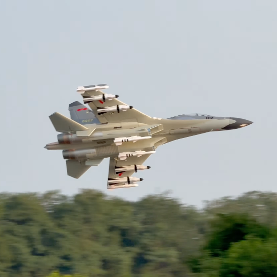FMS J11 Twin 70mm EDF Jet making a low pass with full ordnance during a real-world flight review