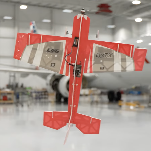 Eflite UMX Eratix 3D FF 450mm performing hover maneuver in aircraft hangar demonstrating ultra-micro 3D flight capability