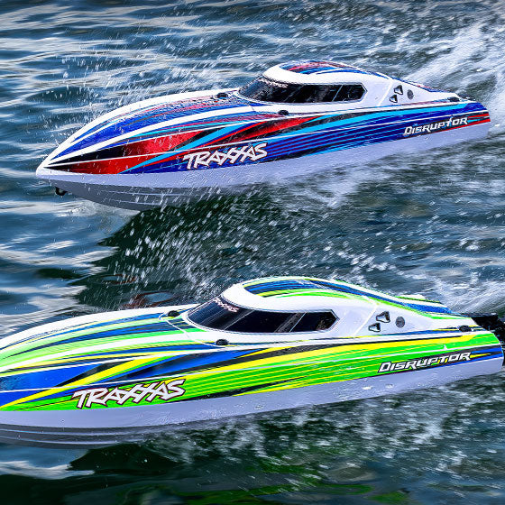 Two Traxxas Disruptor VXL-4s brushless RC boats running at speed with large rooster tails