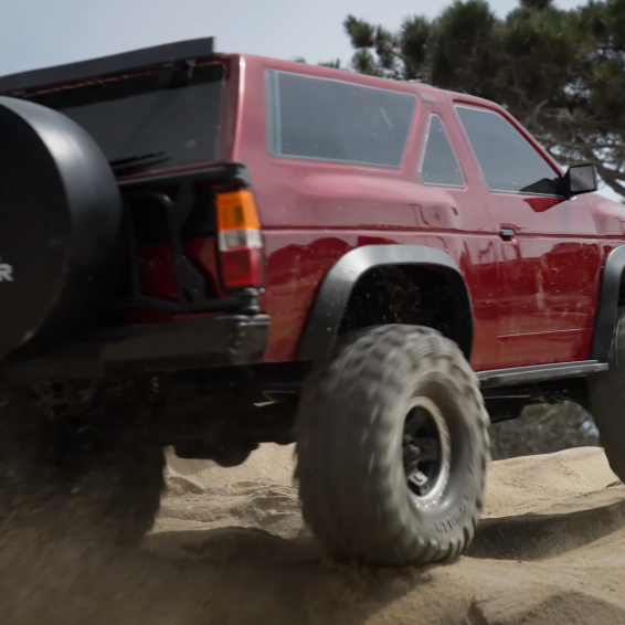 Traxxas TRX-4 Nissan Pathfinder 1/10 RC Crawler with portal axles, 2S–3S LiPo battery power, and officially licensed 80s SUV body
