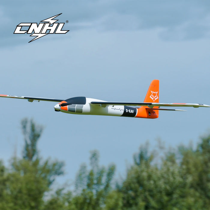 CNHL KAVAN Pulse 2200 V2 2206mm PNP RC electric sport glider in orange flying low over grass