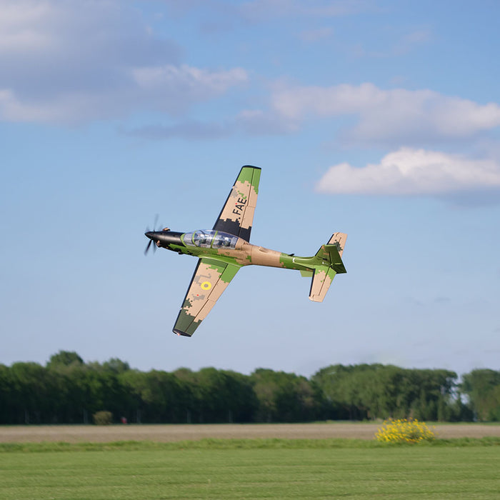 CNHL Super Tucano V2 1600mm performing a scale banking turn in flight
