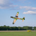 CNHL Super Tucano V2 1600mm performing a scale banking turn in flight