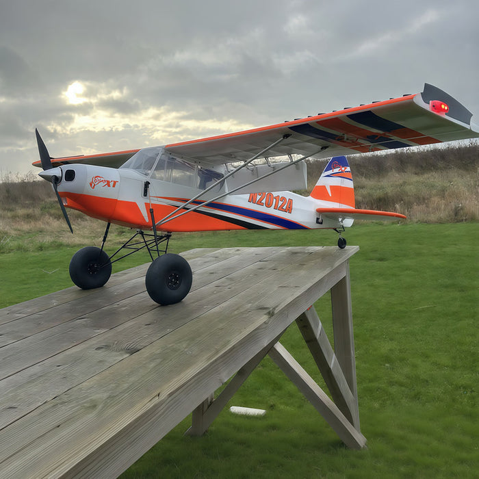 CNHL Bison XT STOL V2 1750mm orange bush plane close up on landing gear and tundra tires