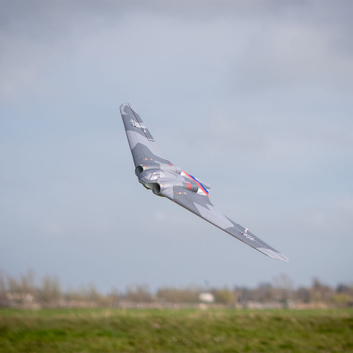 CNHL AviNationRC Horten Ho 229 RC plane in flight low over grass field