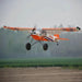 CNHL Bison XT STOL V2 1750mm orange high wing STOL airplane front view in flight