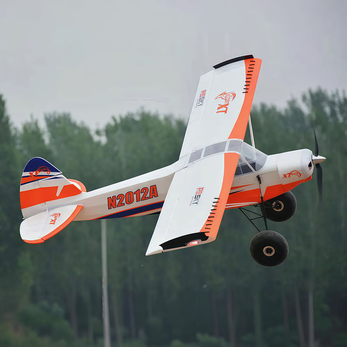 CNHL Bison XT STOL V2 1750mm orange RC airplane tail and underside view in flight