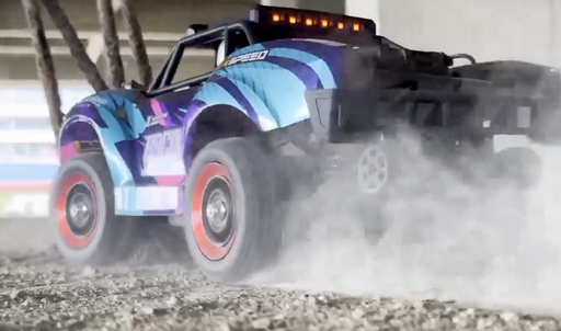 SCY 18103 Pro brushless RC short course truck drifting on dirt road with LED lights on video