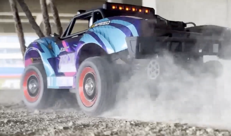 SCY 18103 Pro brushless RC short course truck drifting on dirt road with LED lights on video
