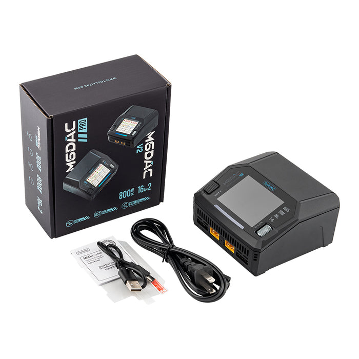 ToolkitRC M6DAC V2 charger package including USB cable, AC cable, and quick manual